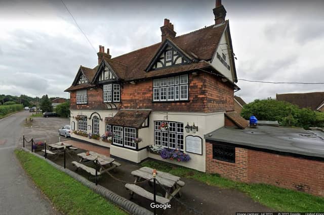 The Holmbush Inn. Faygate Lane, Horsham RH12 4SH. Photo from Google Maps.