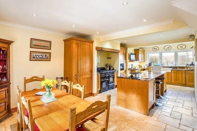 On the ground floor there is a 27-foot open plan kitchen/breakfast room with a large central island. Picture: Hamptons - Haywards Heath Sales.