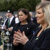 Sinn Fein leader Mary Lou McDonald (left) and Deputy First Minister Michelle O'Neill during the funeral of senior Irish Republican and former leading IRA figure Bobby Storey at the Republican plot at Milltown Cemetery in west Belfast. PA Photo. Picture date: Tuesday June 30, 2020. See PA story FUNERAL Storey. Photo credit should read: Liam McBurney/PA Wire