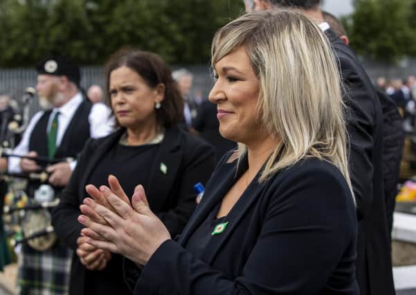 Sinn Fein leader Mary Lou McDonald (left) and Deputy First Minister Michelle O'Neill during the funeral of senior Irish Republican and former leading IRA figure Bobby Storey at the Republican plot at Milltown Cemetery in west Belfast. PA Photo. Picture date: Tuesday June 30, 2020. See PA story FUNERAL Storey. Photo credit should read: Liam McBurney/PA Wire