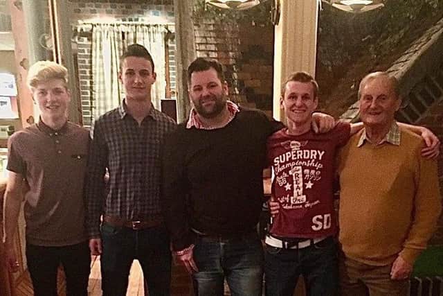 Ethan with his brothers, uncle and Grandfather.