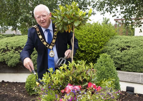 Mayor of Antrim and Newtownabbey, Ald John Smyth launches this year's Best Kept Garden competition.
