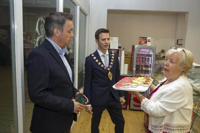 Mabel Richmond from Bake chats with the Mayor, Cllr Peter Johnston and Glyn Roberts, Retail NI.