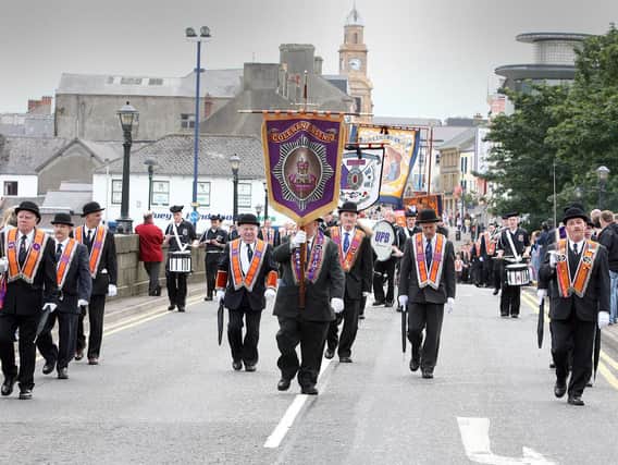 A Twelfth parade makes its way over the Old Bridge in Coleraine to Killowen in 2007
