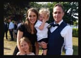 Claire and Adam Carroll with their children Niomi and Elijah.