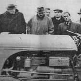 The Ulster Premier Lord Craigavon, first from the left, with the Minister of Agriculture, Sir Basil Brooke, second from left, watch tractor ploughing students gain some valuable tips in November 1939. PICTURE: News Letter Archives