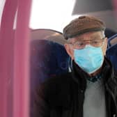 A passenger wearing a protective face mask on board a bus in Belfast. PICTURE BY STEPHEN DAVISON