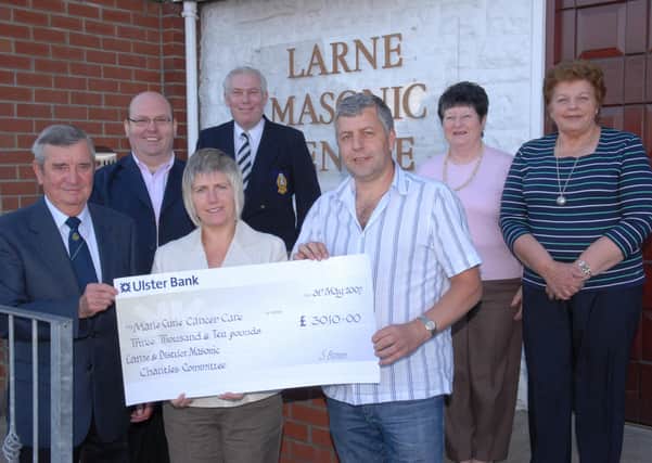 William Martin took part in the Great Wall of China Trek to raise money for Marie Curie Cancer Care. The walk raised a total of over £9000.  William is a member of Magheramorne Masonic Lodge and from the money raised £3010 was presented through the Larne and District Masonic Charities Committee to Aileen McKee of the Larne branch of Marie Curie Cancer Care. Also pictured are Charity Committee Steward of Charities Tommy Hunter;  Bro Bobby O'Toole of Olderfleet Lodge; Charities Committee Chairman Ted Geary; Lilian Geary and Edna Martin. LT23-333-PR