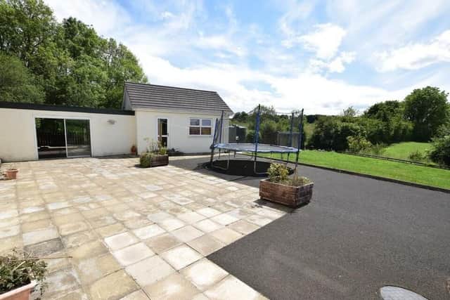 Outside features include stunning countryside views to the rear and a  large patio to rear