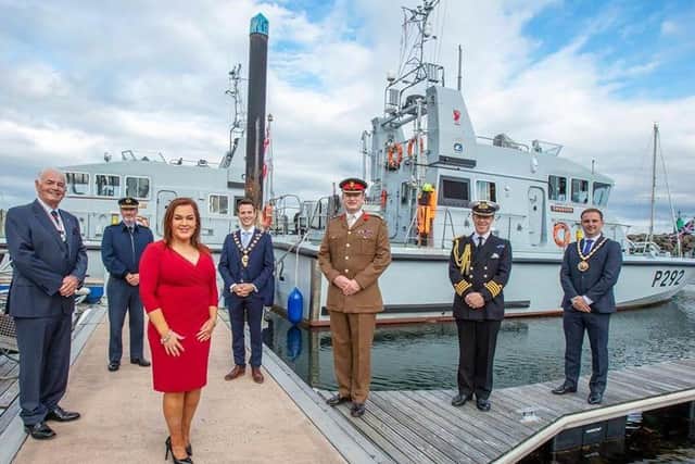 Anne Donaghy, chief executive of Mid and East Antrim Council, with (from left) Deputy Lord Lieutenant Norman Walker, Air Marshall Sean Reynolds,the Mayor, Councillor Peter Johnston, Brigadier Chris Davies, Captain Chris Smith and the Deputy Mayor, Cllr Andrew Wilson, to welcome The Royal Navy's P2000 vessels to Carrickfergus marina as part of their summer deployment.