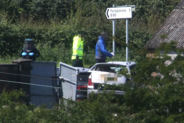 Police at the scene of an accident on the Lisnahunshin Road/Ballyconnolly Road between Cullybackey and Portglenone. Pic: Steven McAuley/McAuley Multimedia