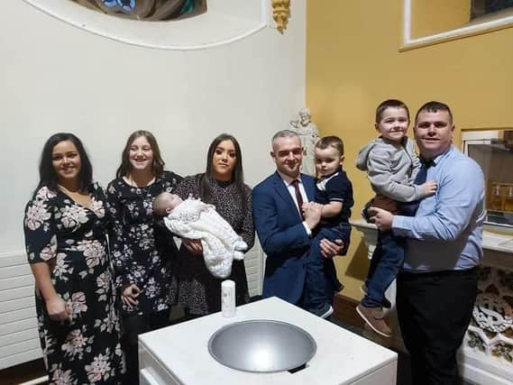 THE McLAUGHLIN CLAN: Aisling, Cara, Niamh, Baby Riona, Seany, Aaron, Caolan and Eamon at Rionas christening.