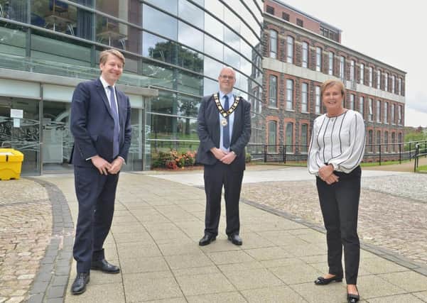 Minister of State, Robin Walker MP is welcomed to Mossley Mill by Mayor of Antrim and Newtownabbey, Cllr Jim Montgomery and Chief Executive, Mrs Jacqui Dixon.