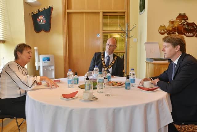 Minister of State Robin Walker in conversation with tthe Mayor of Antrim and Newtownabbey, Cllr Jim Montgomery and Jacqui Dixon, council chief executive.