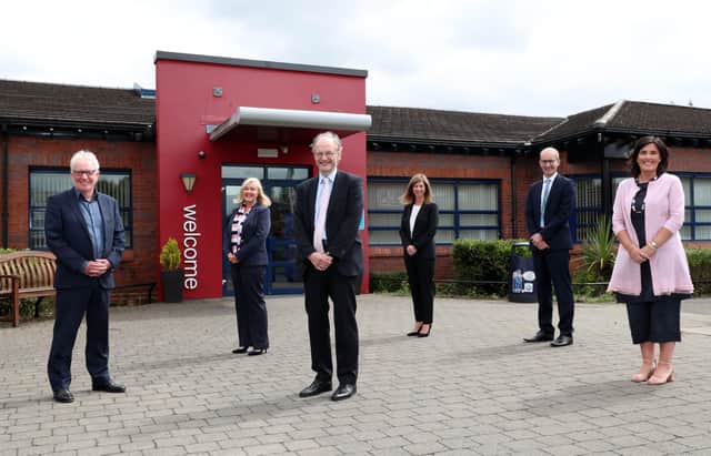 Education Minister Peter Weir with the expert panel established to examine the links between educational underachievement and social disadvantage. Photo by Pacemaker.