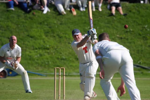 Glendermott's Gordon Montgomery drills this one to the boundary during their loss at Newbuildings. Picture by CricketEurope
