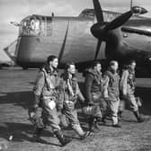 flight crew of a Armstrong Whitworth Whitley Mark V twin-engined, front line medium bomber of 102 Squadron 4 Group Bomber Operations Royal Air Force prior to taking off on a leaflet-dropping ('Nickelling') sortie over Germany on 8 March 1940 from RAF Driffield near Driffield, East Riding of Yorkshire, England (Photo by Davis/Topical Press Agency/Getty Images)