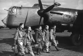 flight crew of a Armstrong Whitworth Whitley Mark V twin-engined, front line medium bomber of 102 Squadron 4 Group Bomber Operations Royal Air Force prior to taking off on a leaflet-dropping ('Nickelling') sortie over Germany on 8 March 1940 from RAF Driffield near Driffield, East Riding of Yorkshire, England (Photo by Davis/Topical Press Agency/Getty Images)