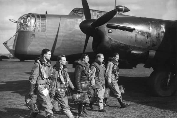 flight crew of a Armstrong Whitworth Whitley Mark V twin-engined, front line medium bomber of 102 Squadron 4 Group Bomber Operations Royal Air Force prior to taking off on a leaflet-dropping ('Nickelling') sortie over Germany on 8 March 1940 from RAF Driffield near Driffield, East Riding of Yorkshire, England (Photo by Davis/Topical Press Agency/Getty Images)