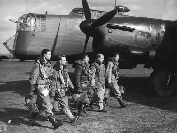 flight crew of a Armstrong Whitworth Whitley Mark V twin-engined, front line medium bomber of 102 Squadron 4 Group Bomber Operations Royal Air Force prior to taking off on a leaflet-dropping ('Nickelling') sortie over Germany on 8 March 1940 from RAF Driffield near Driffield, East Riding of Yorkshire, England (Photo by Davis/Topical Press Agency/Getty Images)
