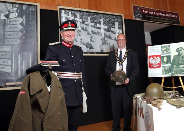 Her Majesty's Lord-Lieutenant of Co Antrim Mr David McCorkell is joined by the Mayor of Antrim and Newtownabbey Cllr Jim Montgomery at the launch of 'For Our Freedom and Yours' Exhibition which is part of the council's VJ DAy 75 commemorations.
