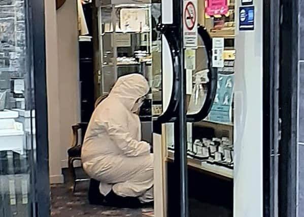 Cash and jewellery were taken in an armed robbery at Campbell's Jewellers, Church Lane, on Saturday afternoon. INPT33-210.
Photo by Tony Hendron.