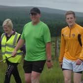 Brian and his supporters on one of his previous big walks