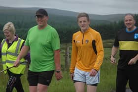 Brian and his supporters on one of his previous big walks