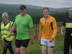 Brian and his supporters on one of his previous big walks
