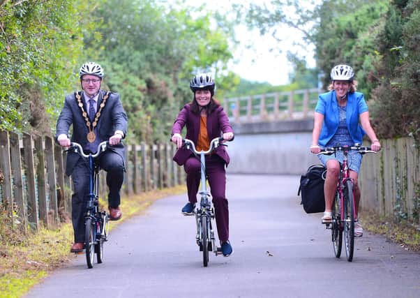 Minister Nichola Mallon is joined on her cycle on the new Blaris Greenway by Caroline Bloomfield, Sustrans Northern Ireland Director and Cllr Nicholas Trimble, Mayor of Lisburn & Castlereagh City Council