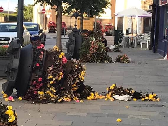 The damaged flower planters
