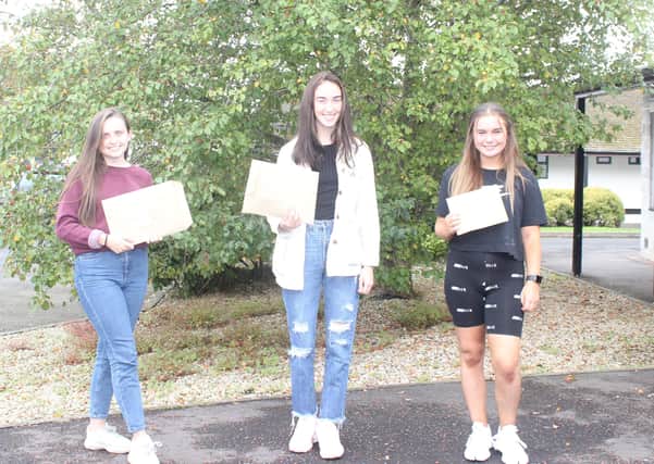Students Amber Moran, Alanna McGrath and Amy Corbett receiving their results in New-Bridge Integrated College on Thursday