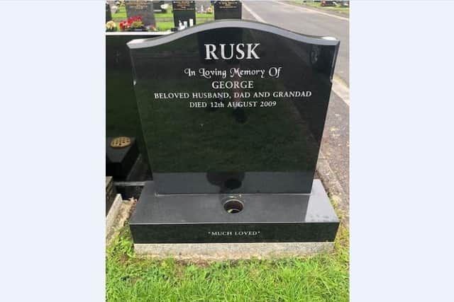 The grave of George Rusk without flowers.