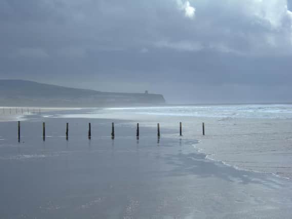 Portstewart Strand, looking west to the Barmouth and Mussenden Temple beyond. Portstewart, Co Londonderry. Picture: Wikimedia Commons