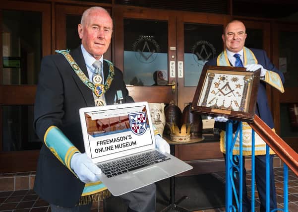 Freemasons Ivan Gillespie and David Martin with some of the treasured artefacts from the Freemasons Museum