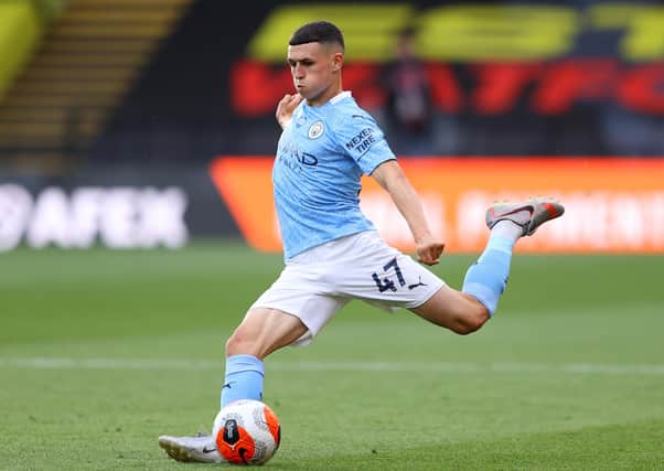 Phil Foden of Man City in action during the Premier League match between Watford FC and Manchester City at Vicarage Road on July 21, 2020 in Watford, England. (Photo by Richard Heathcote/Getty Images)