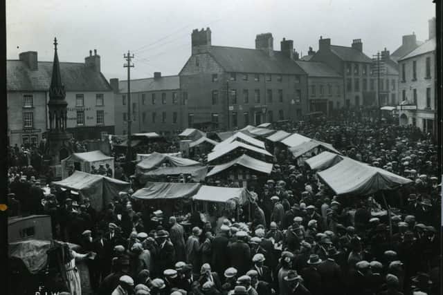 Crowds pack out the streets eating dulse and checking out horses and other fare at the Oul Lammas Fair. (Photo: Chronicle and Constitution Archive, Coleraine Museum.)
