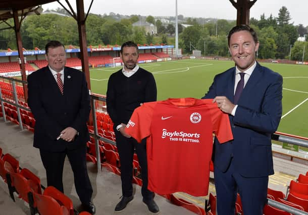 Leon Blanche head of communications at BoyleSports bookmakers pictured with Larne Chairman Gareth Clements and manager Tiernan Lynch after the betting giants teamed up with the Larne club to have their logo on the playing shirts.

Photo by Stephen Hamilton



Inver Men Confirm Deal with Ireland's Largest Bookmaker as Principal Partners

BoyleSports have been unveiled as brand new sponsors after agreeing a principal partnership deal with Larne FC for the upcoming 2020/21 season.

The agreement will see the BoyleSports logo adorn the front of the playing kit for both senior men and ladies' sides in what represents the company's first football sponsorship deal in Northern Ireland.

Established by John Boyle when he opened his first shop in Markethill, County Armagh in 1982, BoyleSports is Ireland's largest owned bookmaker and boasts over 300 shops across the UK and Ireland.

The family-owned firm realised a long-held ambition earlier this year by bolstering its presence in Northern Ireland with the acquisition o