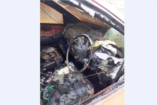 Car destroyed in arson attack.