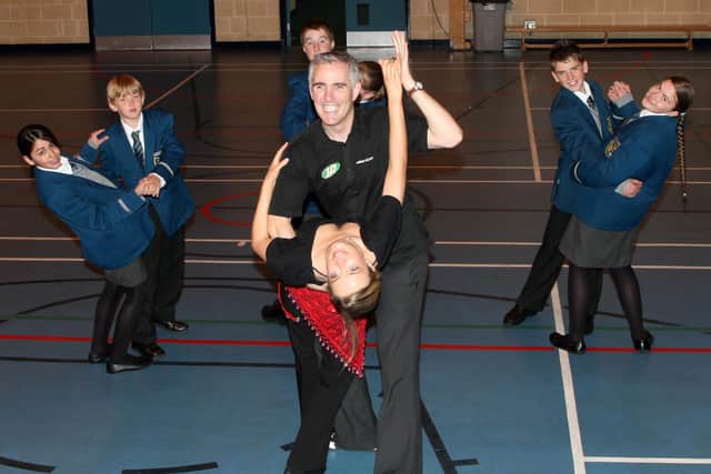Salsa dance teachers Chris Scullion and Noelle Meenagh show students from Slemish College a few moves during last week’s dance class which was held as part of their celebration of Languages Day. BT39-141JC