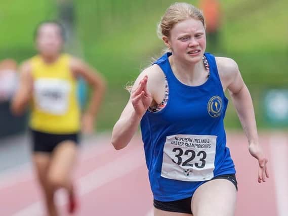 Olympian YAC's Sophie Parlour on her way to a hat-trick of Ulster and NI titles at the Mary Peters track.