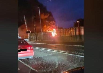 A vehicle was set alight on the railway line in Lurgan.