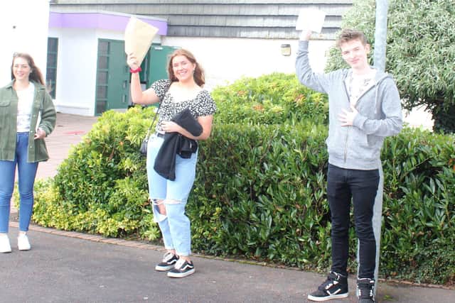 Students Lucy McVey Lucy O'Neill and Connor Synnott celebrate GCSE results at New-Bridge