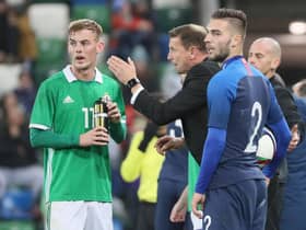 Mark Sykes in discussion with manager Ian Baraclough during a fixture for Northern Ireland under 21s. Pic by Pacemaker.