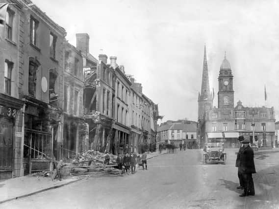 Market Square in Lisburn in the aftermath of the riots showing O’Shea Hardware Store and Browne’s Pub. Picture courtesy of Irish Linen Centre and Lisburn Museum