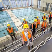 Project Board Members check out the impressive 50-metre pool at the soon-to-be-opened South Lake Leisure Centre.