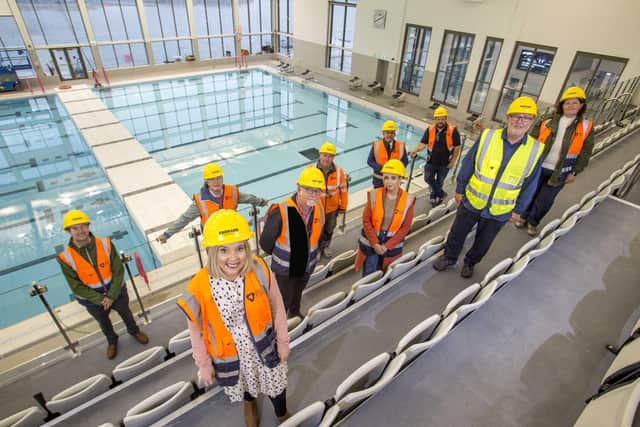 Project Board Members check out the impressive 50-metre pool at the soon-to-be-opened South Lake Leisure Centre.