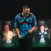 Daryl Gurney celebrates his win over Nathan Aspinall. PICTURE: Lawrence Lustig/PDC