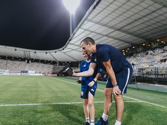 Oran Kearney shares a special moment with his son Luca. PICTURE: David Cavan