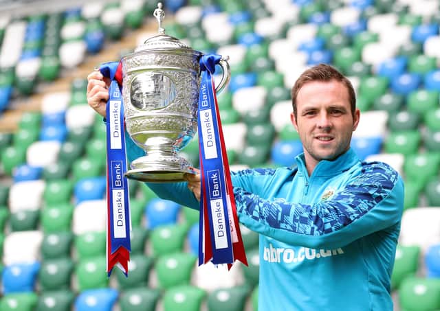 Linfield captain Jamie Mulgrew with the Gibson Cup. Pic by Pacemaker.
